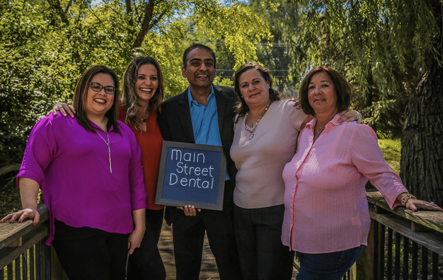 Dr and Staff photo About us Main Street Dental dentist in East Dundee, IL Dr. Amish Desai